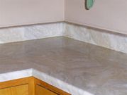 Kitchen counter tops decorated in faux paint finish Travertine French Vanilla