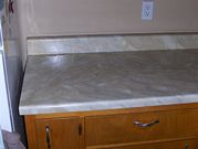 Kitchen counter tops decorated in faux paint finish Travertine French Vanilla